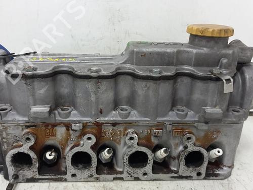 Used Cylinder head OPEL KADETT E (T85) 1.6 i (C19, D19) (75 hp) 21131849