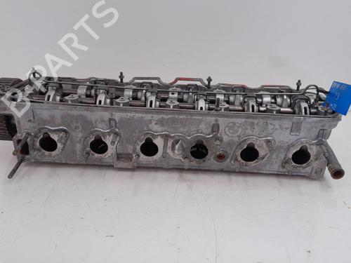 Used Cylinder head BMW 3 (E30) 325 i (171 hp) 29329561