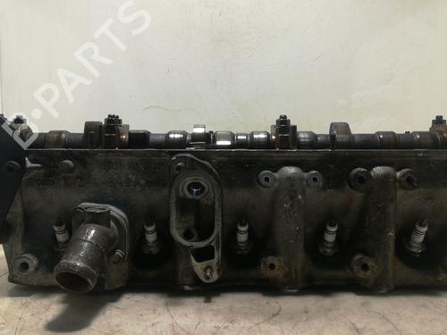 Used Cylinder head AUDI A6 C4 (4A2) 2.3 (133 hp) 28543811