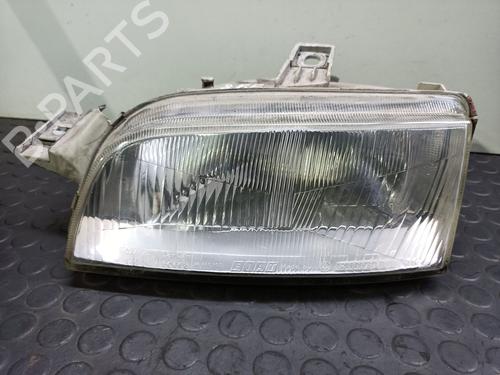 Used Left headlight FIAT PUNTO (176_) 55 1.1 (54 hp) 22999791