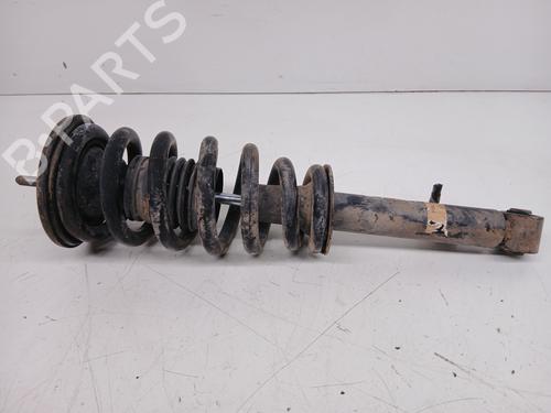 Used Left front shock absorber MITSUBISHI L200 / TRITON (KA_T, KB_T) 2.5 DI-D (KA4T) (128 hp) 25771187