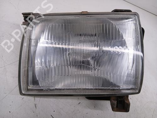 Used Left headlight NISSAN PICK UP (D22) 2.5 TD 4WD (103 hp) 26206139