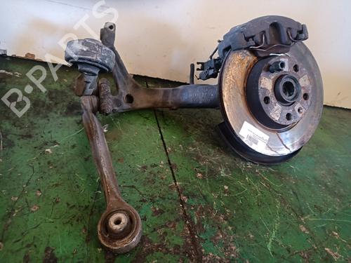 Used Left front steering knuckle VW PASSAT B5 (3B2) 1.9 TDI (115 hp) 32476621