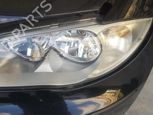 Used Left headlight Left headlight BMW 1 (E87) 118 d (122 hp) 20879359 20879359