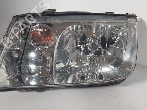 Used Left headlight VW BORA Variant (1J6) 1.9 TDI (101 hp) 21851399