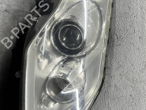 Used Right headlight RENAULT LAGUNA III (BT0/1) 2.0 dCi (BT01, BT08, BT09, BT0E, BT0K, BT12, BT1C, BT1D,... (150 hp) 32215635