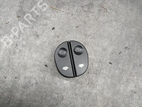 Comutador vidro frente esquerdo FORD FIESTA V (JH_, JD_) 1.3 (69 hp) 30911204