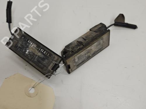Used Licence plate light RENAULT LAGUNA III (BT0/1) 1.5 dCi (BT00, BT0A, BT0T, BT1J) (110 hp) 28331652