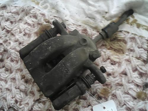Used Left rear brake caliper BMW 1 (E81) 116 d (116 hp) 20991368