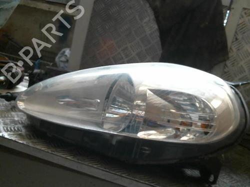 Used Left headlight FIAT GRANDE PUNTO (199_) 1.3 D Multijet (75 hp) 20988577