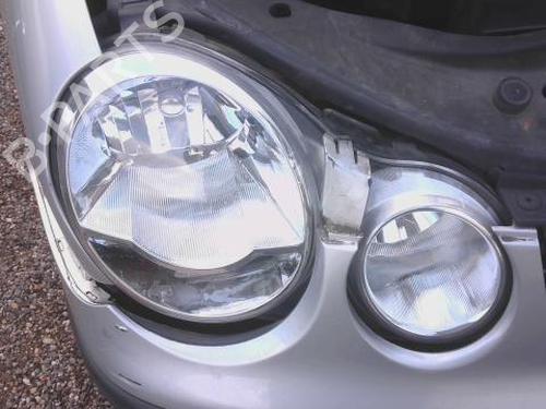 Used Right headlight VW POLO IV (9N_, 9A_) 1.2 12V (64 hp) 31794409
