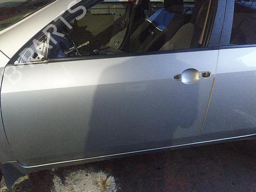 Used Left front door NISSAN PRIMERA Hatchback (P12) 1.9 dCi (120 hp) 20859675
