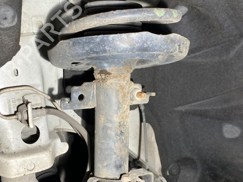 Used Left front shock absorber RENAULT SCÉNIC III (JZ0/1_) 1.6 dCi (JZ00, JZ12) (130 hp) 23797297