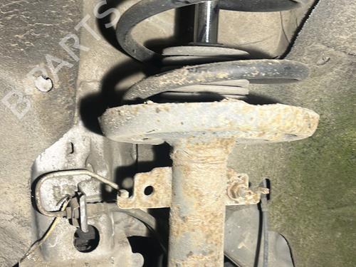 Used Left front shock absorber RENAULT SCÉNIC III (JZ0/1_) 1.5 dCi (110 hp) 31852234