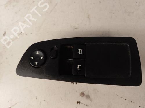 Used Left front window switch BMW 1 (E87) 118 d (122 hp) 21373594