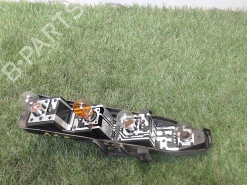 Used Licence plate light RENAULT SCÉNIC II (JM0/1_) 1.9 dCi (JM0G, JM12, JM1G, JM2C) (120 hp) 25389792