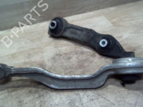 Used Left front suspension arm RENAULT LAGUNA III (BT0/1) 1.5 dCi (BT00, BT0A, BT0T, BT1J) (110 hp) 25385078