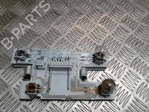 Used Licence plate light RENAULT CLIO I (B/C57_, 5/357_) 1.2 (B/C/S57A, B/C57S, 5/357F, 5/357J, 5/357L, 5/357R) (58 hp) 31237730