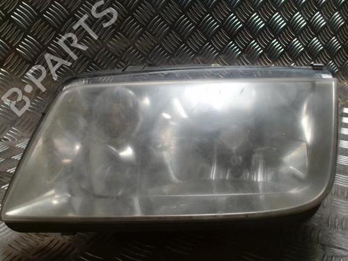 Phare gauche VW BORA I (1J2) 1.9 TDI (115 hp) 31060168