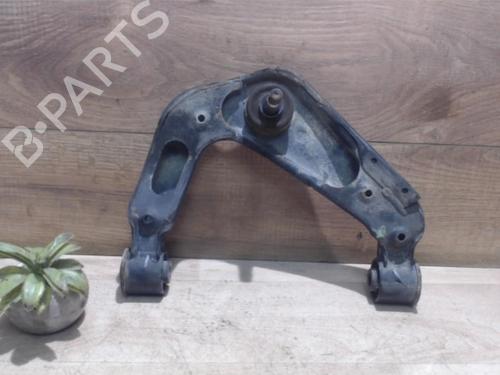 Used Left front suspension arm NISSAN NAVARA NP300 (D40) 2.5 dCi (144 hp) 25384773