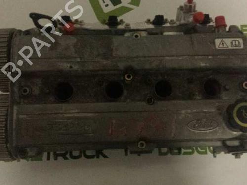 Used Cylinder head FORD ESCORT V (AAL, ABL) 1.6 i 16V (88 hp) 21424965