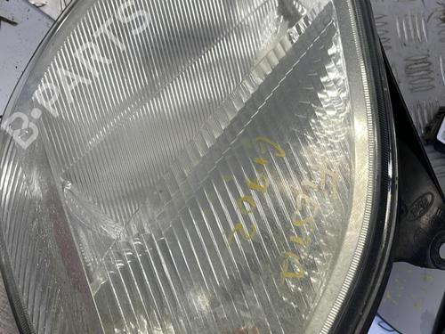 Used Left headlight FORD FIESTA V (JH_, JD_) 1.4 TDCi (68 hp) 21846659