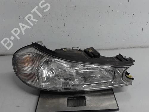 Used Right headlight FORD MONDEO II (BAP) 1.8 TD (90 hp) 21316395