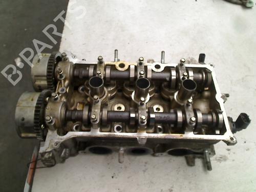 Used Cylinder head SUZUKI ALTO VII (GF) 1.0 (AMF310, GFC31S) (68 hp) 21920865