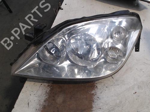 Used Left headlight NISSAN PRIMERA (P12) 1.8 (115 hp) 21940743