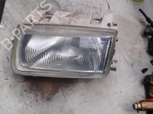 Used Left headlight VW POLO III (6N1) 60 1.4 (60 hp) 21939307