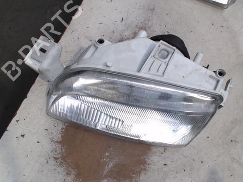 Used Left headlight FIAT PUNTO (176_) 60 1.2 (176AP, 176AR, 176AQ, 176BB) (60 hp) 21940771