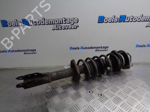 Used Left front shock absorber DAIHATSU CUORE VII (L275_, L285_, L276_) 1.0 (L276) (70 hp) 23011093