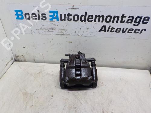 Used Right front brake caliper NISSAN MICRA III (K12) 1.2 16V (80 hp) 23006536