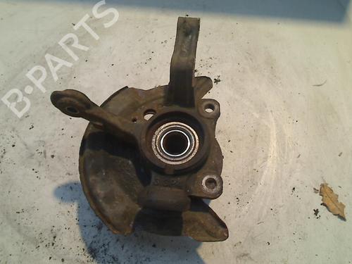 Used Left front steering knuckle DAIHATSU CUORE VI (L251, L250_, L260_) 1.0 (58 hp) 21917398