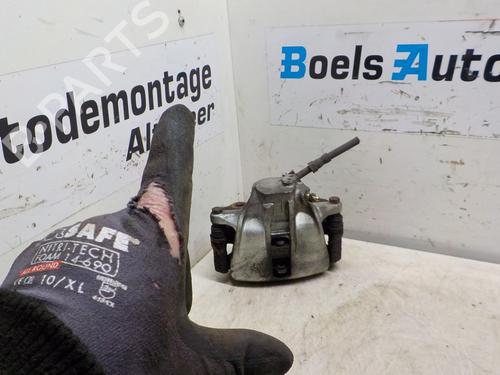 Used Left front brake caliper VW CADDY II Box Body/MPV (9K9A) 1.9 SDI (64 hp) 23027306
