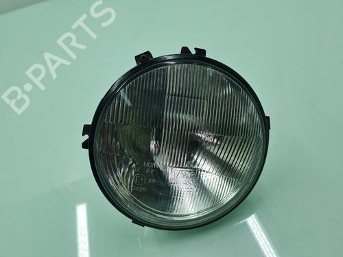 Used Left headlight LAND ROVER DEFENDER Station Wagon (L316) 2.5 Td5 4x4 (L316) (122 hp) 21652778