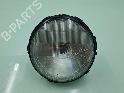 Used Left headlight LAND ROVER DEFENDER Station Wagon (L316) 2.5 Td5 4x4 (L316) (122 hp) 21653709