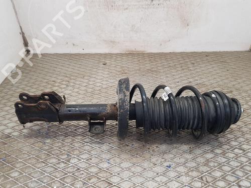 Used Left front shock absorber VAUXHALL CORSA Mk IV (E) (X15) 1.4 (75 hp) 29343166