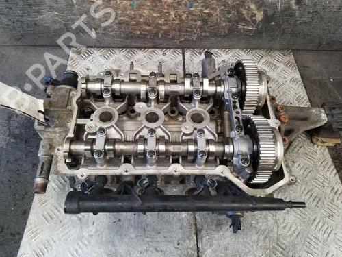 Used Cylinder head PEUGEOT 208 I (CA_, CC_) 1.0 VTi (68 hp) 32509642