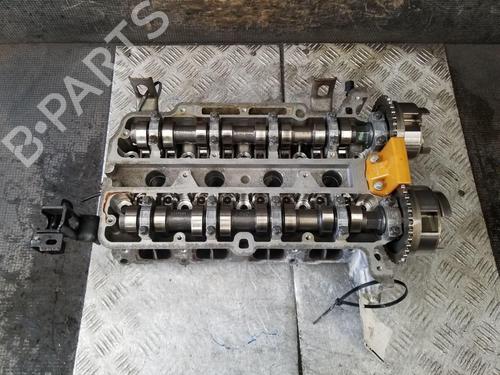Used Cylinder head Cylinder head VAUXHALL CORSA Mk III (D) (S07) 1.2 i 16V (L08) (86 hp) 36478677 36478677
