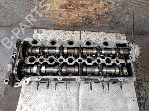 Used Cylinder head VOLVO V70 II (285) D5 (163 hp) 29642144