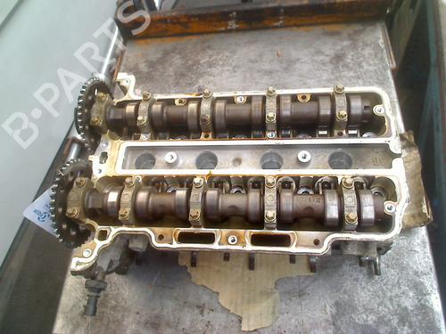 Used Cylinder head Cylinder head OPEL CORSA C (X01) 1.2 (F08, F68) (75 hp) 36405964 36405964