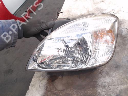 Used Left headlight KIA RIO II (JB) 1.4 16V (97 hp) 24825625