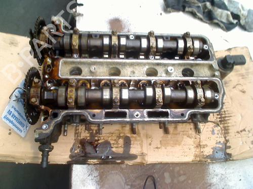 Used Cylinder head OPEL CORSA D (S07) 1.2 (L08, L68) (80 hp) 27718181