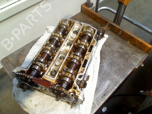 Used Cylinder head OPEL CORSA D (S07) 1.4 (L08, L68) (90 hp) 29898072