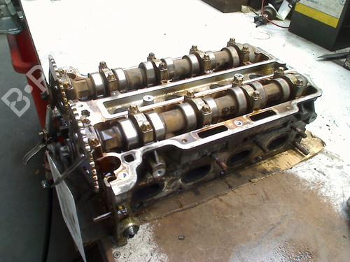 Used Cylinder head OPEL CORSA C (X01) 1.4 Twinport (F08, F68) (90 hp) 32395249