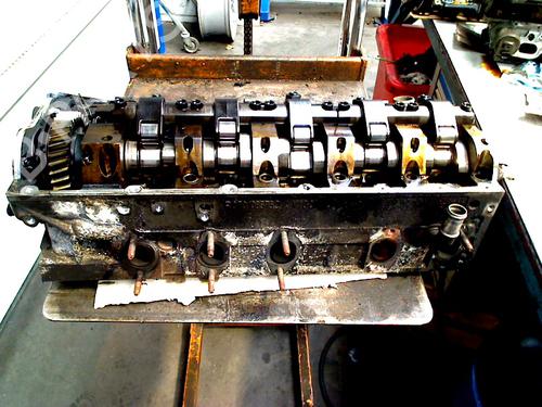 Used Cylinder head VW TRANSPORTER T5 Van (7HA, 7HH, 7EA, 7EH) 2.5 TDI (130 hp) 31028295