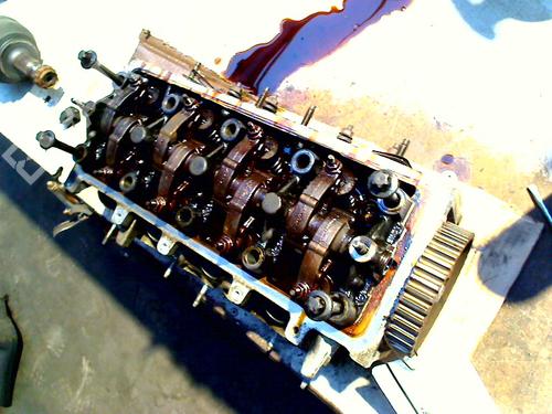 Used Cylinder head PEUGEOT 206 Hatchback (2A/C) 1.4 i (75 hp) 30497301