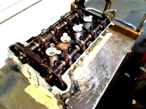 Used Cylinder head OPEL ZAFIRA / ZAFIRA FAMILY B (A05) 2.2 (M75) (150 hp) 30497342