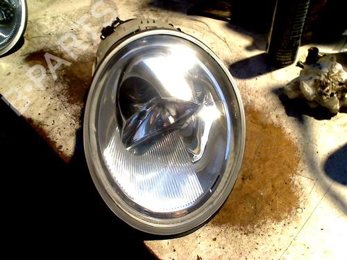 Used Left headlight VW NEW BEETLE (9C1, 1C1) 2.0 (115 hp) 31128260